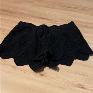 Black scalloped shorts